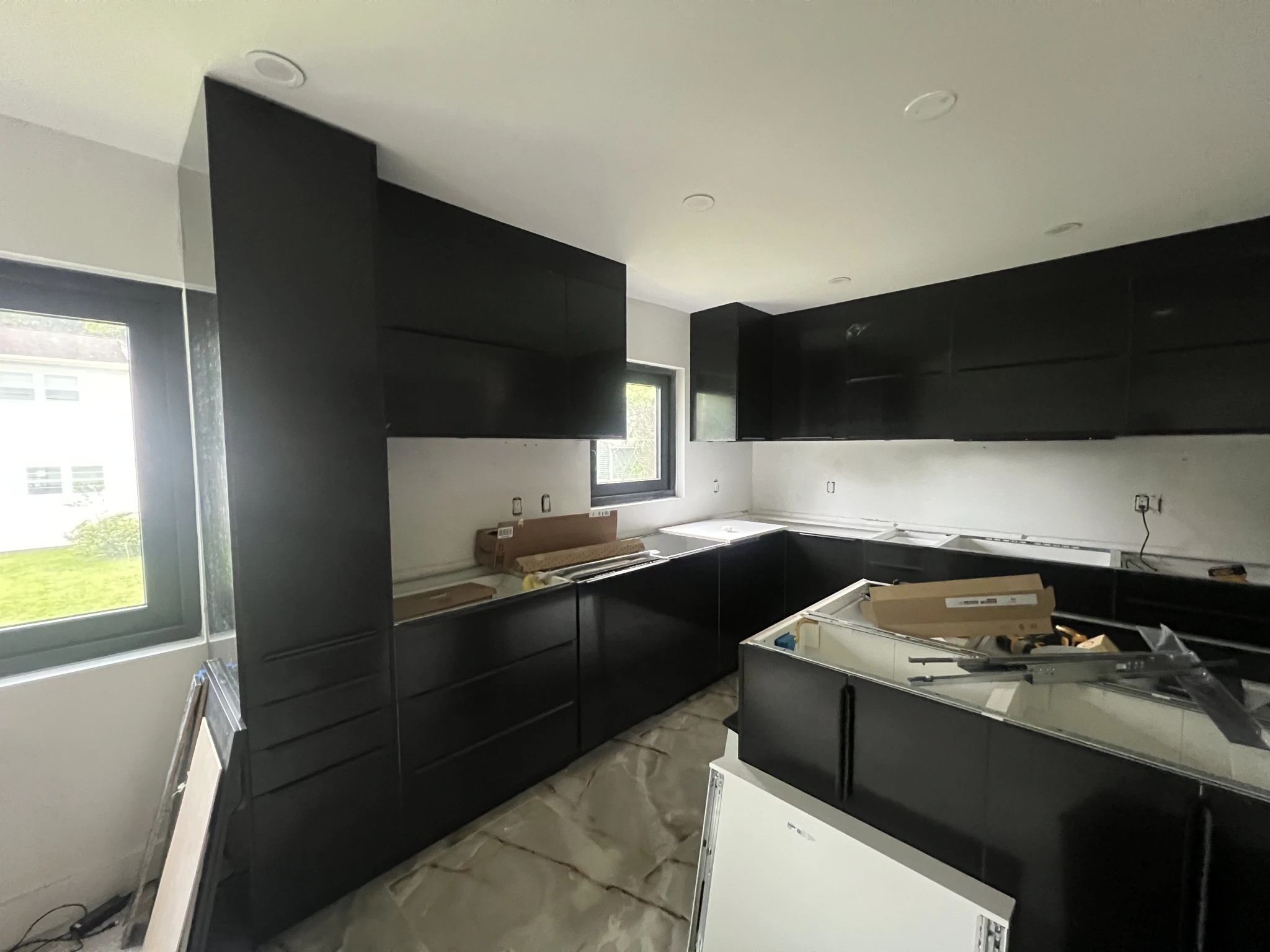 All-Black Matte U-Shaped Kitchen — photo 1