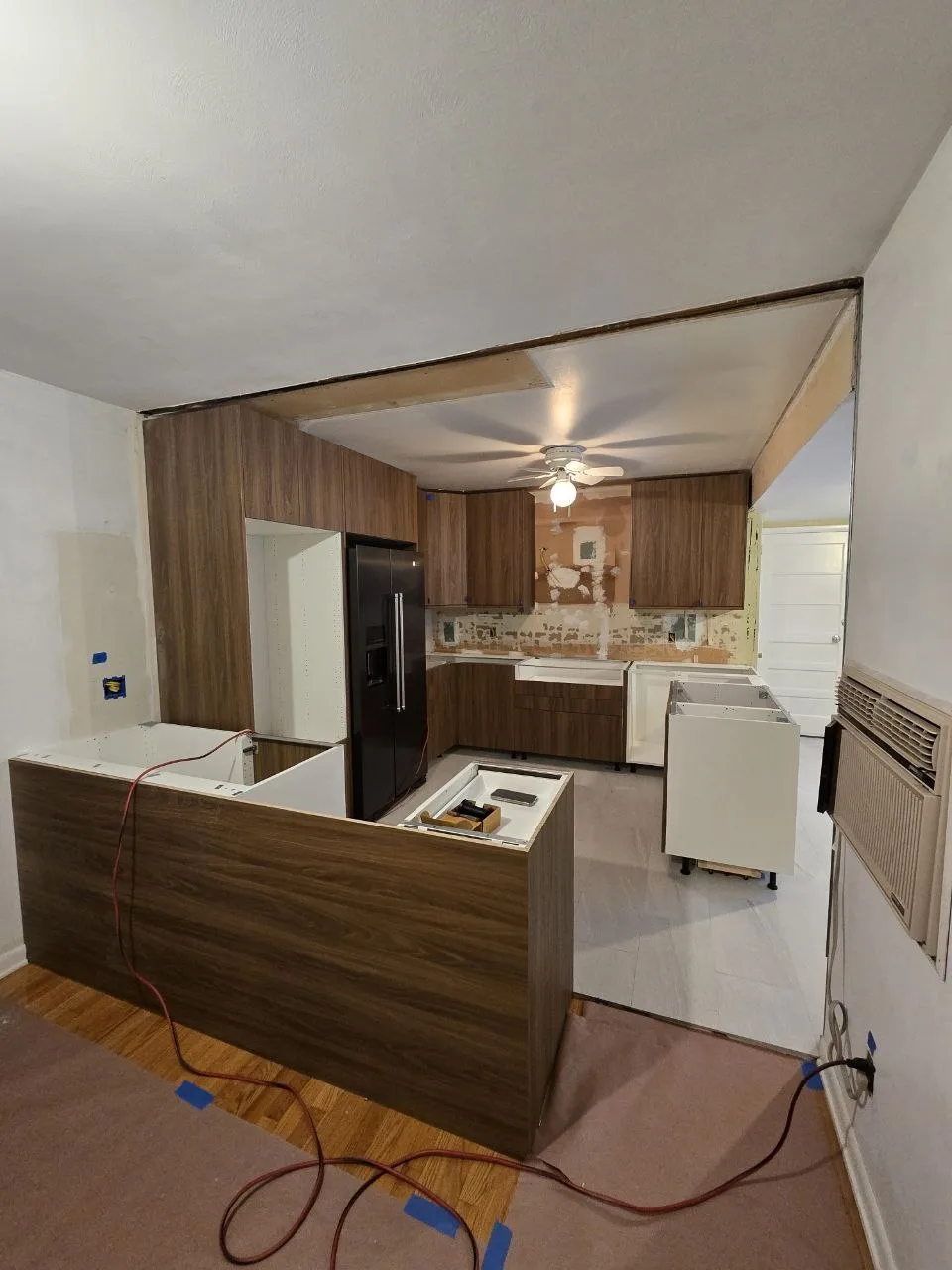 IKEA kitchen installation near Sunset Park, NY — Walnut & White Kitchen with Island