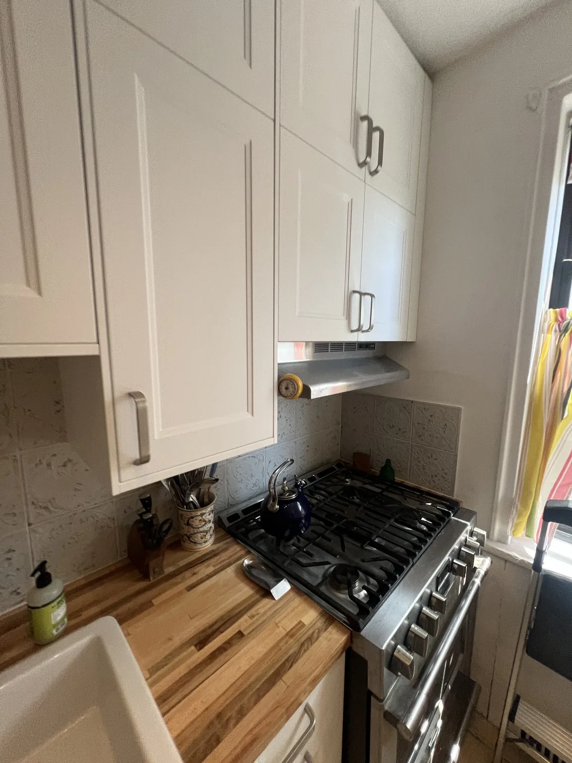 IKEA kitchen installation near Hell's Kitchen, NY — White Shaker Galley Kitchen