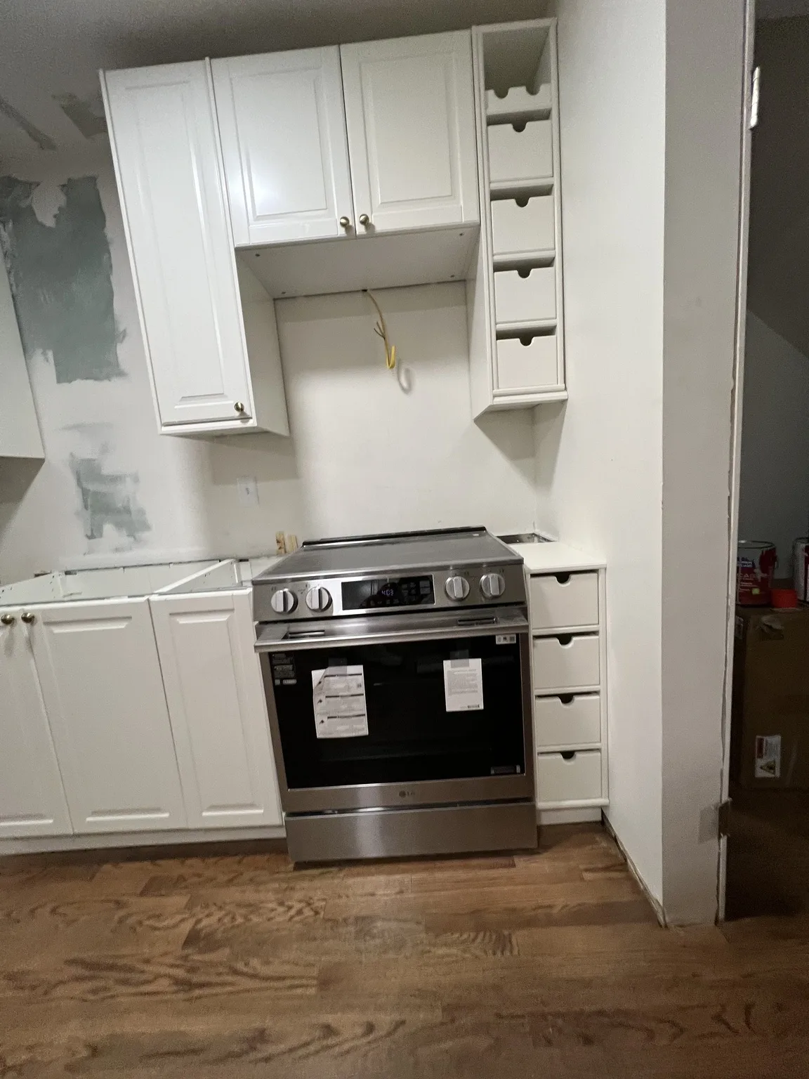 IKEA kitchen installation near SoHo, NY — White Kitchen with Stainless Range