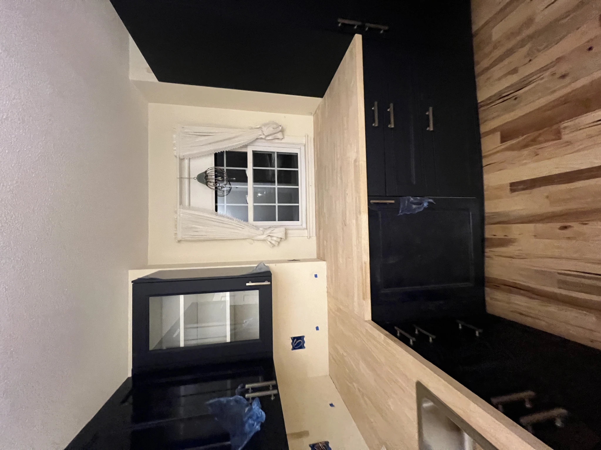 Dark Navy Kitchen with Butcher Block — photo 1